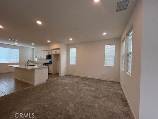 Empty room, Interior, Kitchen, Recessed Lighting, Stainless Steel Appliances