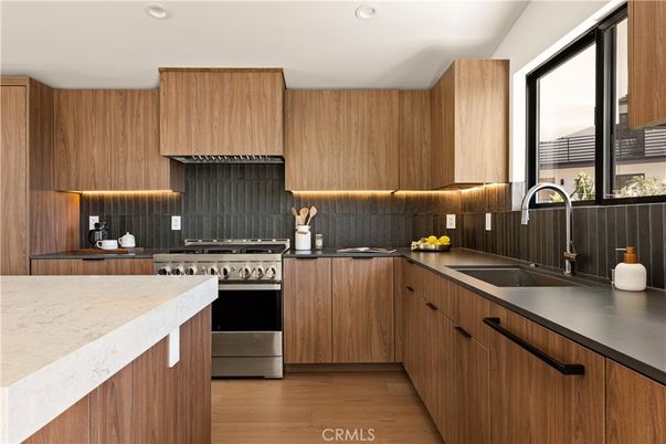 Interior, Kitchen, Recessed Lighting, Stainless Steel Appliances, Wood Texture Flooring