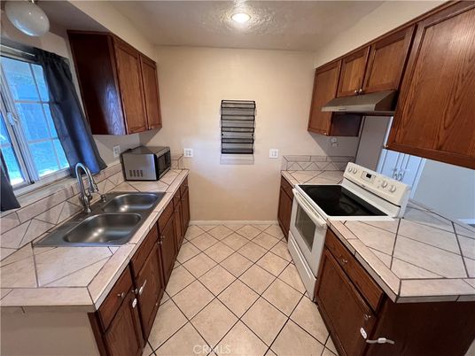 Interior, Kitchen, Recessed Lighting, Tile Countertops