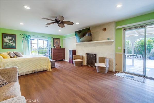 Bedroom, Fireplace, Interior, Recessed Lighting, Wood Texture Flooring