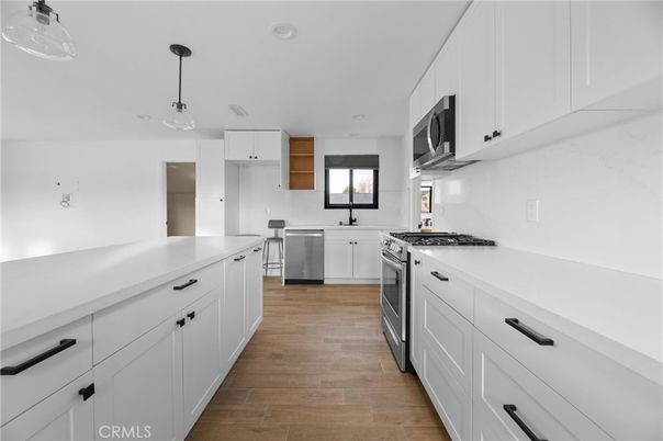 Interior, Kitchen, Pendant Lights, Recessed Lighting, Stainless Steel Appliances, Wood Texture Flooring