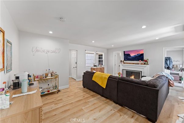 Fireplace, Interior, Living room, Recessed Lighting, Wood Texture Flooring
