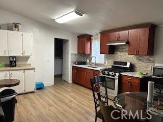 Interior, Kitchen, Stainless Steel Appliances, Stone Walls, Wood Texture Flooring