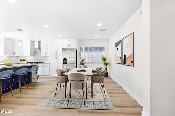 Dining room, Interior, Kitchen, Pendant Lights, Recessed Lighting, Stainless Steel Appliances, Wood Texture Flooring