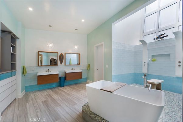 Bathroom, Dual Sink Vanities, Free Standing Baths, Interior, Pendant Lights, Recessed Lighting, Wood Texture Flooring