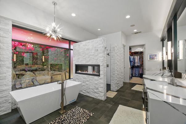 Bathroom, Fireplace, Free Standing Baths, Interior, Pendant Lights, Recessed Lighting, Stone Walls
