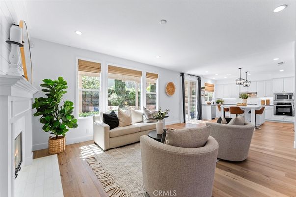 Dining room, Fireplace, Interior, Kitchen, Living room, Pendant Lights, Recessed Lighting, Stainless Steel Appliances, Wood Texture Flooring