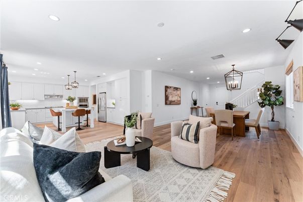 Chandelier, Dining room, Interior, Kitchen, Living room, Pendant Lights, Recessed Lighting, Wood Texture Flooring