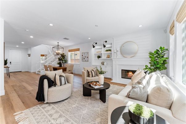 Dining room, Fireplace, Interior, Living room, Pendant Lights, Recessed Lighting, Wood Texture Flooring