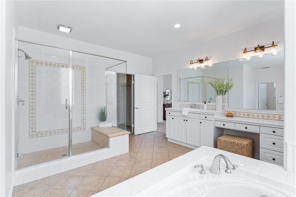 Bathroom, Dual Sink Vanities, Glass Shower, Interior, Recessed Lighting, Tile Countertops