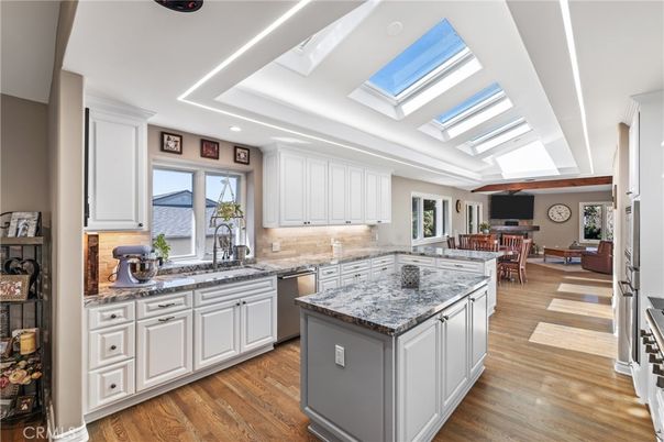 Dining room, Interior, Kitchen, Recessed Lighting, Stainless Steel Appliances, Wood Texture Flooring