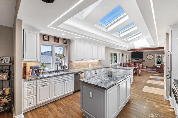 Dining room, Interior, Kitchen, Recessed Lighting, Stainless Steel Appliances, Wood Texture Flooring