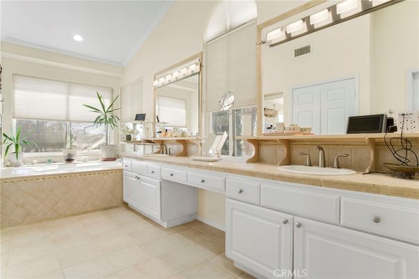 Bathroom, Dual Sink Vanities, Interior, Recessed Lighting, Tile Countertops
