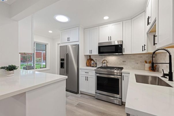 Interior, Kitchen, Recessed Lighting, Stainless Steel Appliances, Wood Texture Flooring