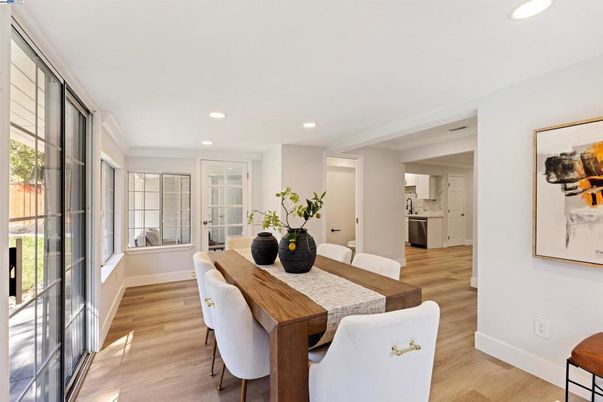 Dining room, Interior, Kitchen, Recessed Lighting, Stainless Steel Appliances, Wood Texture Flooring