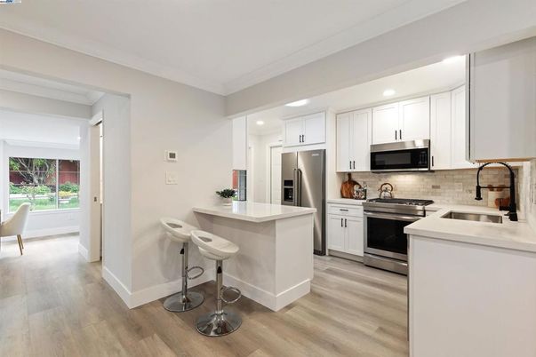 Interior, Kitchen, Recessed Lighting, Stainless Steel Appliances, Wood Texture Flooring