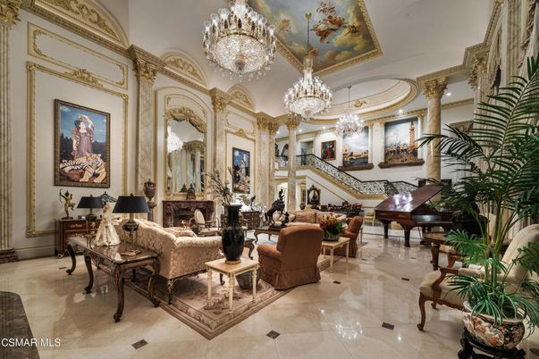 Chandelier, Fireplace, Interior, Living room, Piano, Recessed Lighting