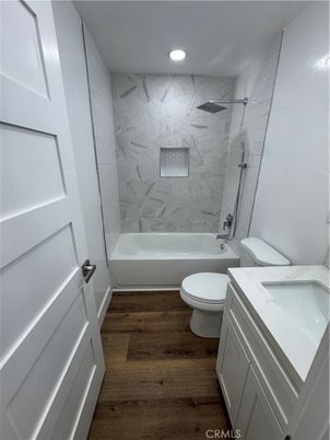 Bathroom, Interior, Marble Walls, Recessed Lighting, Wood Texture Flooring