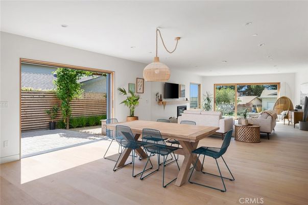 Dining room, Fireplace, Interior, Living room, Pendant Lights, Recessed Lighting, Wood Texture Flooring