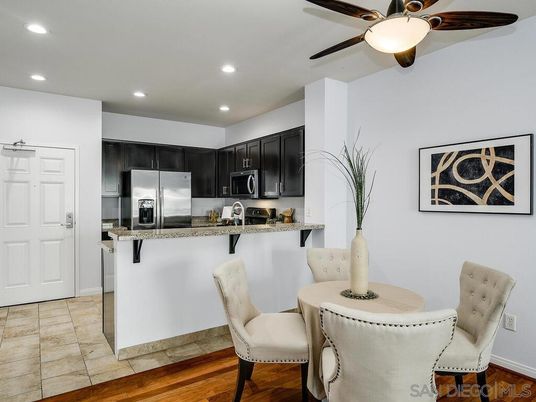 Dining room, Interior, Kitchen, Recessed Lighting, Stainless Steel Appliances, Wood Texture Flooring