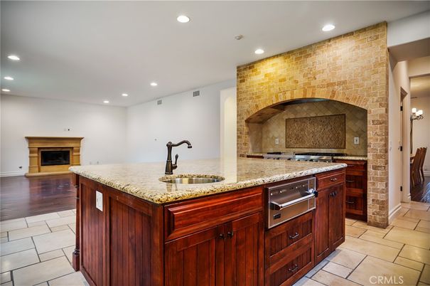 Fireplace, Interior, Kitchen, Recessed Lighting, Stone Walls, Wood Texture Flooring
