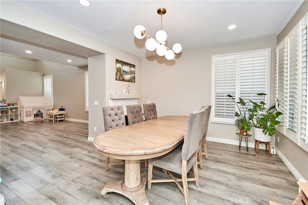 Dining room, Fireplace, Interior, Pendant Lights, Recessed Lighting, Wood Texture Flooring