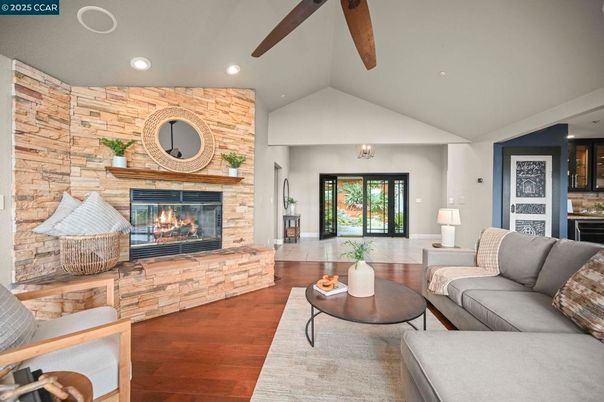 Fireplace, Interior, Living room, Recessed Lighting, Stone Walls, Wooden Beams, Wood Texture Flooring