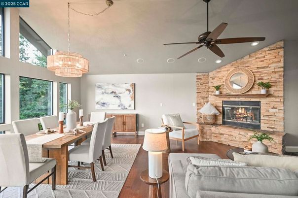 Chandelier, Dining room, Fireplace, Interior, Recessed Lighting, Stone Walls, Wood Texture Flooring