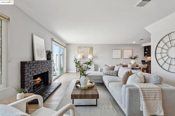 Dining room, Fireplace, Interior, Living room, Recessed Lighting, Wood Texture Flooring