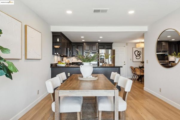 Dining room, Interior, Kitchen, Recessed Lighting, Stainless Steel Appliances, Wood Texture Flooring
