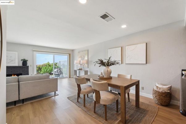 Dining room, Fireplace, Interior, Living room, Recessed Lighting, Wood Texture Flooring