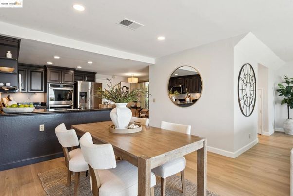 Dining room, Interior, Kitchen, Recessed Lighting, Stainless Steel Appliances, Wood Texture Flooring