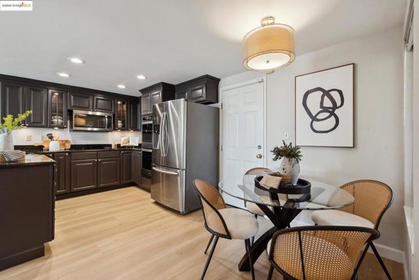 Dining room, Interior, Kitchen, Recessed Lighting, Stainless Steel Appliances, Wood Texture Flooring