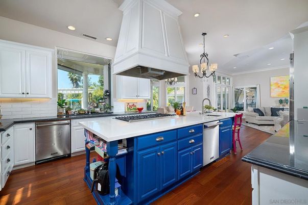 Chandelier, Interior, Kitchen, Living room, Pendant Lights, Recessed Lighting, Stainless Steel Appliances, Wood Texture Flooring