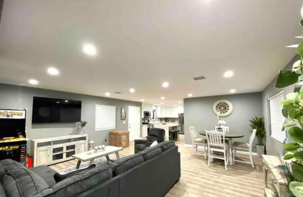 Dining room, Fireplace, Interior, Kitchen, Living room, Recessed Lighting, Wood Texture Flooring