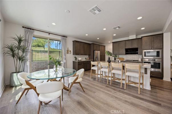 Dining room, Interior, Kitchen, Recessed Lighting, Stainless Steel Appliances, Wood Texture Flooring