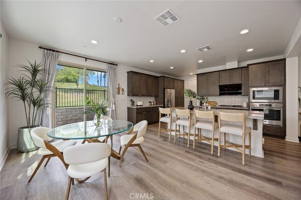 Dining room, Interior, Kitchen, Recessed Lighting, Stainless Steel Appliances, Wood Texture Flooring