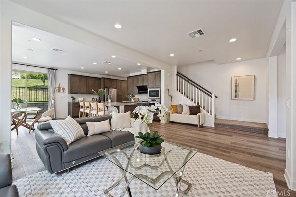 Dining room, Interior, Kitchen, Living room, Recessed Lighting, Stainless Steel Appliances, Wood Texture Flooring