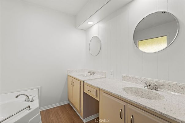 Bathroom, Dual Sink Vanities, Interior, Recessed Lighting, Wood Texture Flooring