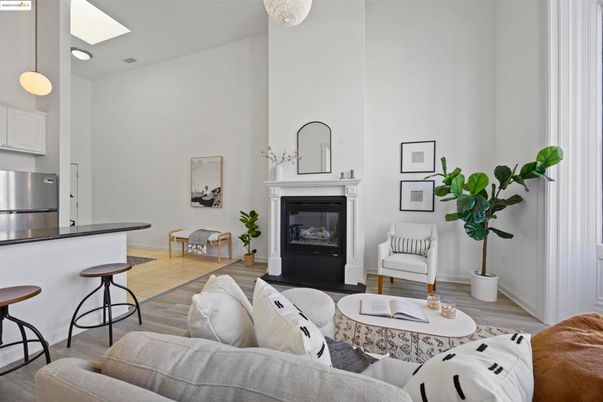 Fireplace, Interior, Kitchen, Living room, Pendant Lights, Recessed Lighting, Stainless Steel Appliances, Wood Texture Flooring