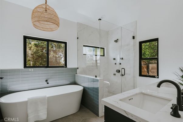 Bathroom, Dual Sink Vanities, Free Standing Baths, Glass Shower, Interior, Marble Walls