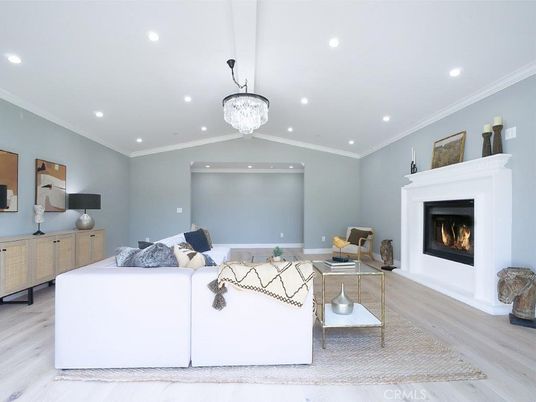 Chandelier, Fireplace, Interior, Living room, Recessed Lighting, Wood Texture Flooring
