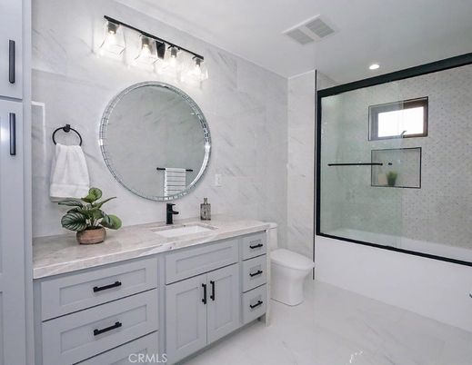 Bathroom, Dual Sink Vanities, Glass Shower, Interior, Marble Walls, Recessed Lighting