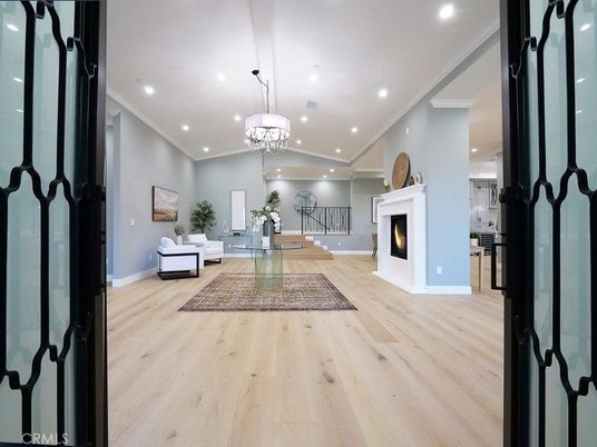 Chandelier, Fireplace, Interior, Living room, Recessed Lighting, Wood Texture Flooring
