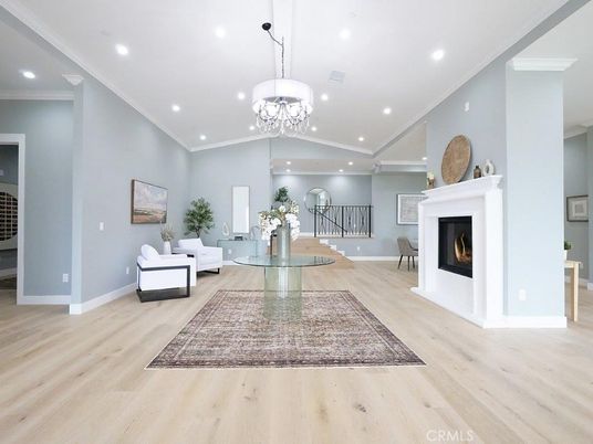 Chandelier, Fireplace, Interior, Living room, Recessed Lighting, Wood Texture Flooring