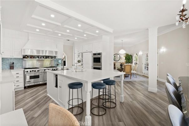 Dining room, Interior, Kitchen, Pendant Lights, Recessed Lighting, Stainless Steel Appliances, Wood Texture Flooring