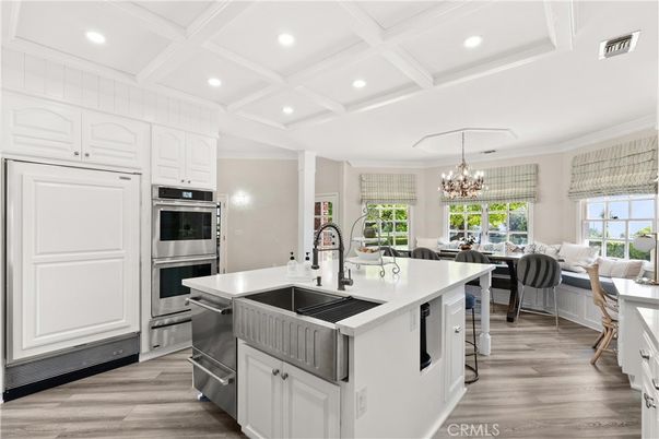 Chandelier, Dining room, Interior, Kitchen, Living room, Recessed Lighting, Stainless Steel Appliances, Wood Texture Flooring