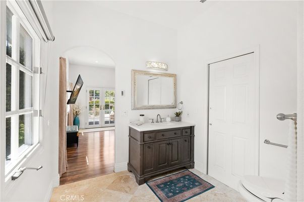 Bathroom, Dual Sink Vanities, Interior, Recessed Lighting, Wood Texture Flooring