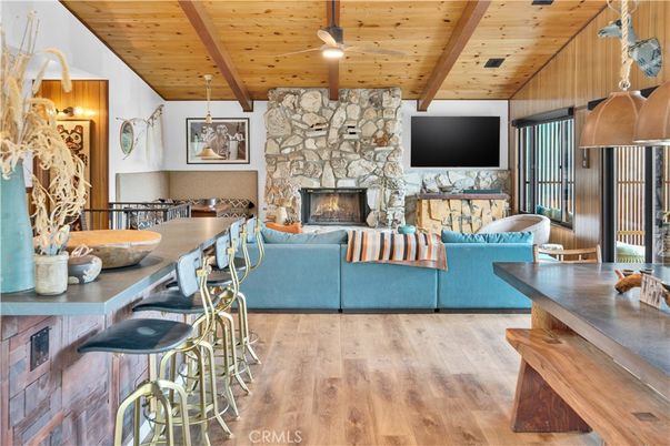 Dining room, Fireplace, Interior, Living room, Pendant Lights, Recessed Lighting, Stone Walls, Wooden Beams, Wooden Ceilings, Wood Texture Flooring