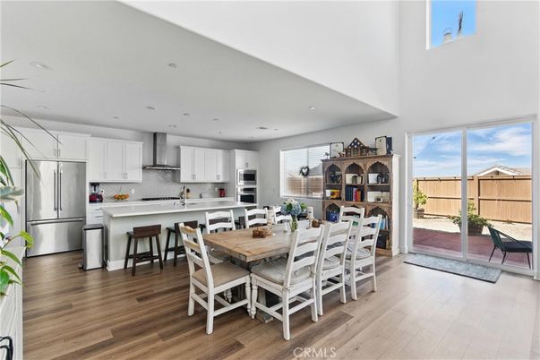 Dining room, Interior, Kitchen, Recessed Lighting, Stainless Steel Appliances, Wood Texture Flooring